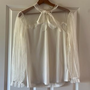 White blouse with long sleeves